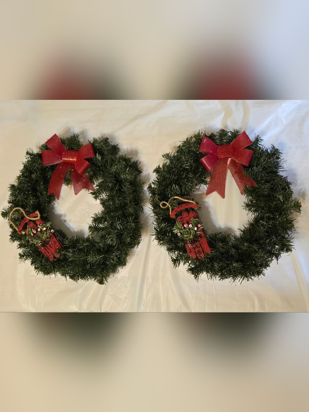 Holiday Evergreen Wreaths with Red Bow and Sleigh Ornament